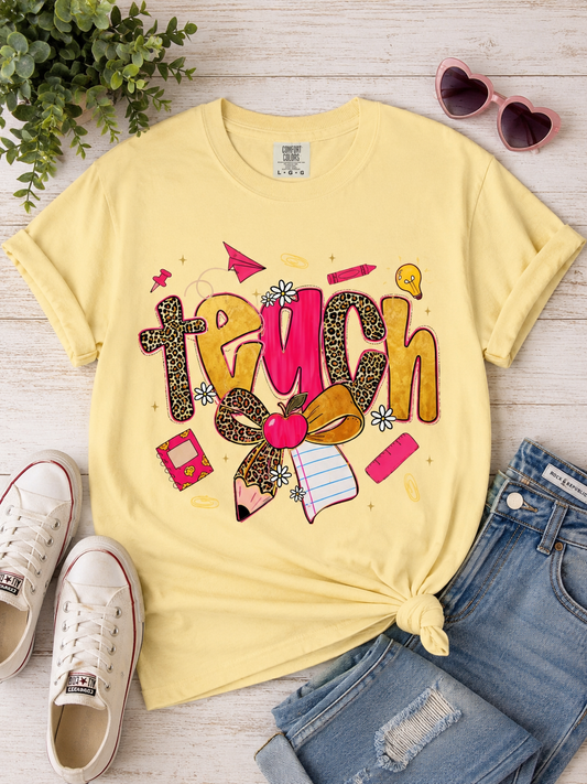 Teacher Graphic T‑Shirt — Colorful 'Teach' School Supplies Design for Educators